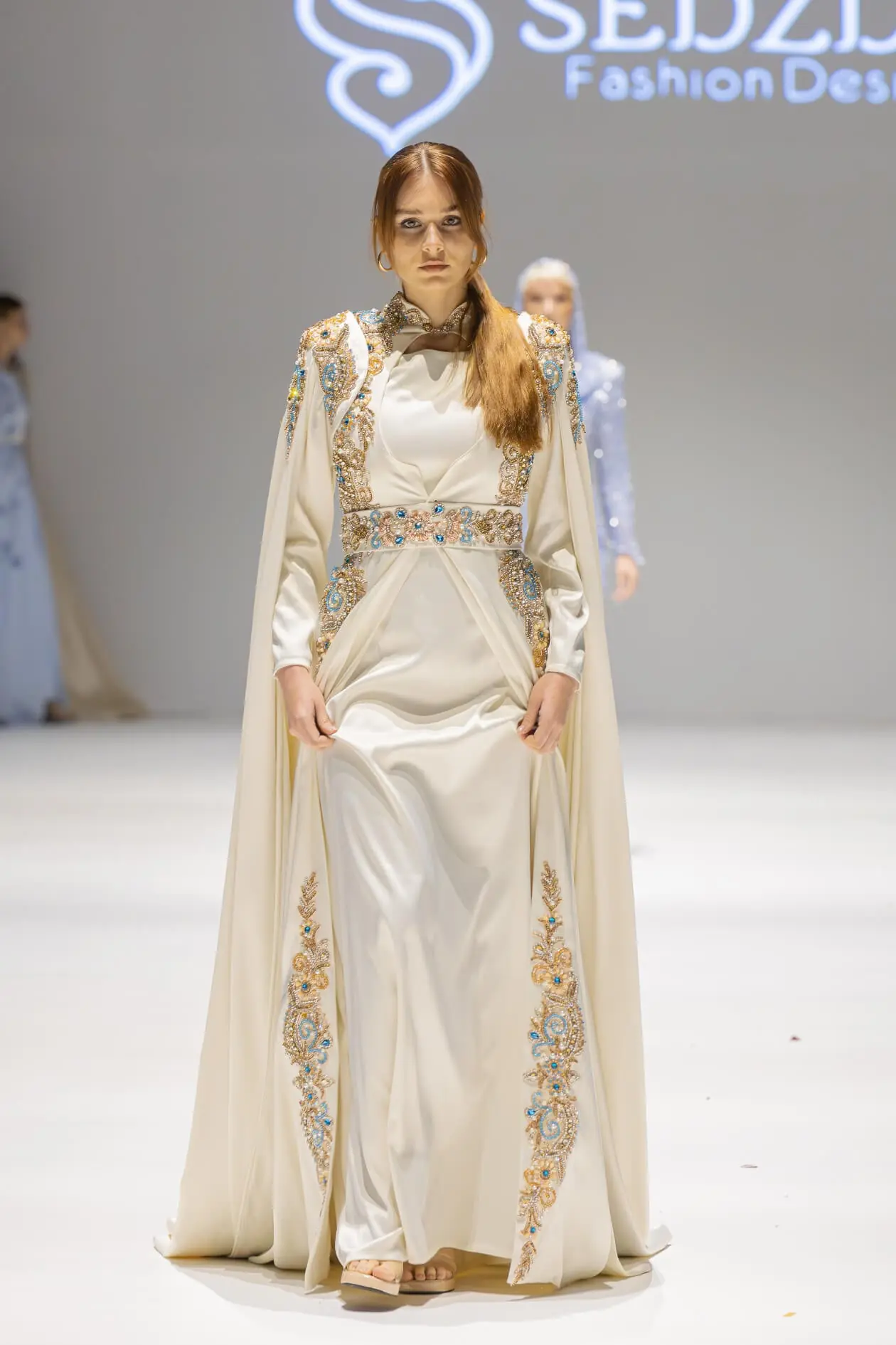 Model 10 The Power of Pain Gown – Champagne